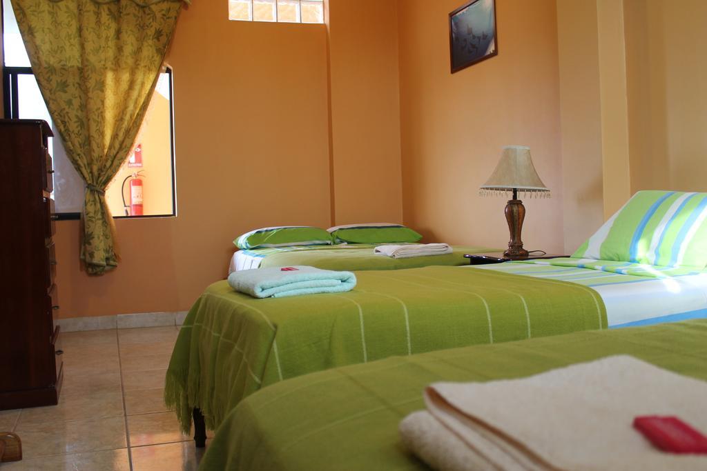 Hotel Dolphin House Puerto Baquerizo Moreno Habitación foto